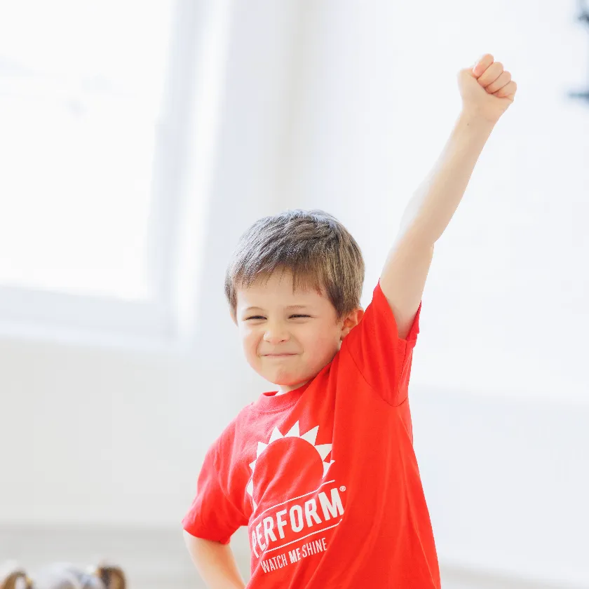 Children performing in a dance class